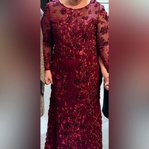 Xscape formal, long, long sleeved cranberry colored gown. Size 16. Worn once